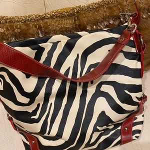 Zebra print with red accents purse